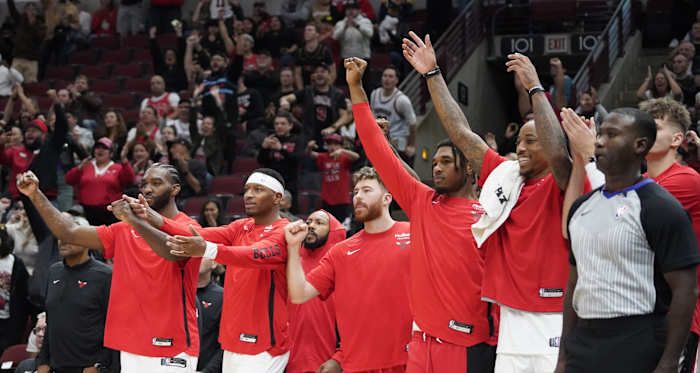 The Chicago Bulls celebrate a basket against the Denver Nuggets during the second half at United Center